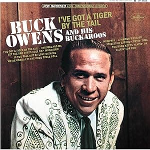 I've Got A Tiger By The Tail (ORANGE VINYL) por Buck Owens — capa do álbum